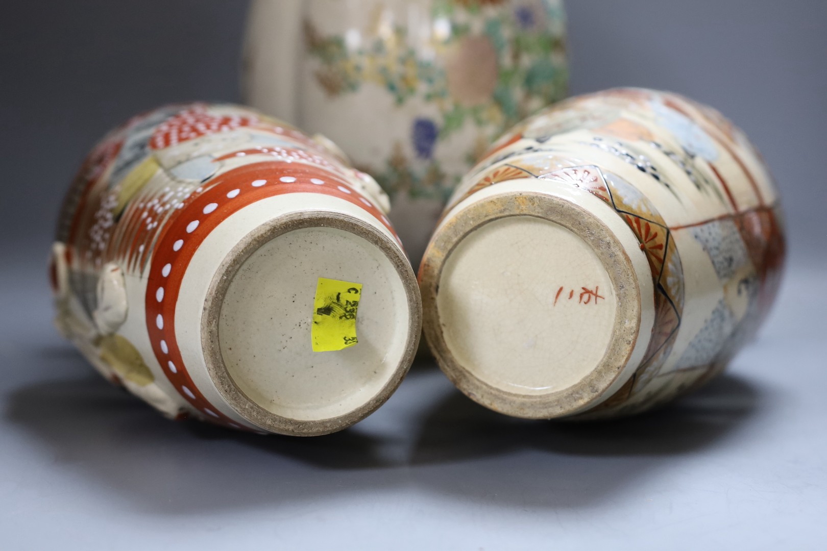 Two Japanese Satsuma vases, 30cm high, together with another (3)